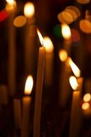 Prayer candles in a church photo