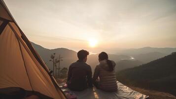 Man and Plenteous woman couple appreciate in they tent at they camping point with morning to start with light see. Creative resource, photo