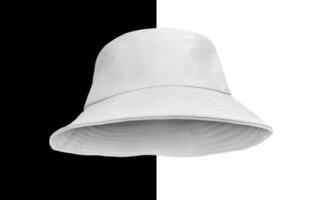 white bucket hat isolated on black and white background photo