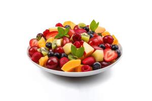 Fruit berry salad on a plate isolated on a white background. photo