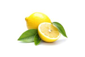 Whole and slice lemon with leaves isolated on white background. photo