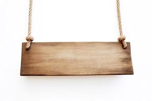 Wooden sign plain hanging from rope isolated on white background. photo