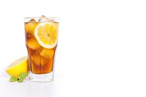 a glass of iced lemon tea with a slice of lemon isolated on white background with copy space. photo