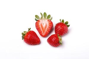 Fresh some whole and sliced strawberries isolated on white background. photo