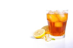 a glass of iced lemon tea with a slice of lemon isolated on white background with copy space. photo