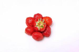 Fresh some whole strawberries isolated on white background. photo