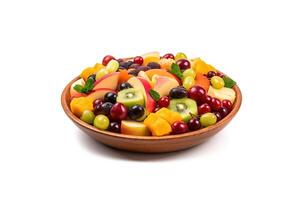 Fruit berry salad on a plate isolated on a white background. photo