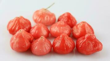 Jambu Air or Red Rose Apple on White Table photo