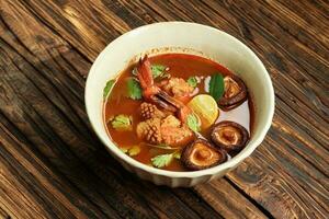 Tom Yam Kung, Spicy Shrimp Soup Popular Thai Hot and Sour Soup Recipe photo