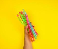 Plastic multi-colored straws photo