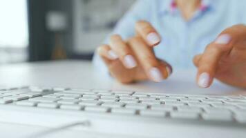 Female hands typing on a computer keyboard. Concept of remote work. Home Office video