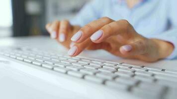 Female hands typing on a computer keyboard. Concept of remote work. Home Office video