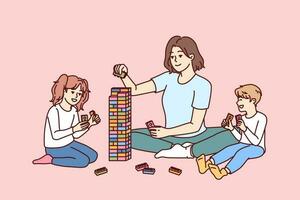 Woman babysitter together with kids plays constructor building tower of children blocks in kindergarten. Little boy and girl have good time and play educational games under supervision of babysitter vector
