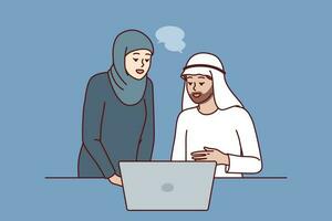 Office workers in Arabic clothing discussing business presentation from laptop. Arabic man and woman work together in corporation in dubai or emirates and conduct business negotiations via internet. vector