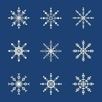 conjunto de Rizado copos de nieve en un azul antecedentes. copos de nieve para invierno diseño. vector. vector