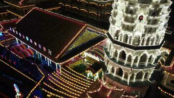 Ayer Itam, Penang, Malaysia, Mar 07 2021, Aerial view descending look down beautiful color led lantern at Chinese temple video