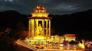 Georgetown, Penang, Malaysia, Mar 07 2021, Drone view Goddess of Mercy statue at night at Kek Lok Si video