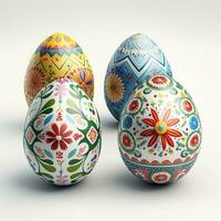 4 colorful painted decorated Easter eggs, white background photo