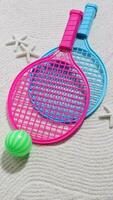 Beach tennis set on sand, summer sport activity photo