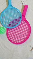 Beach tennis set on sand, summer sport activity photo