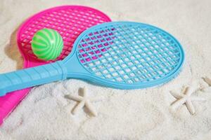 Beach tennis set on sand, summer sport activity photo