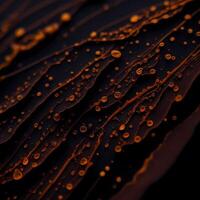 Water drops on a dark background. Close-up macro photography. Abstract wet texture, scattered pure aqua blobs. photo