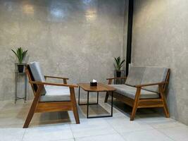 living room with vintage arm chair. minimalist modern interior design photo