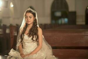 Beautiful bride in the Church photo