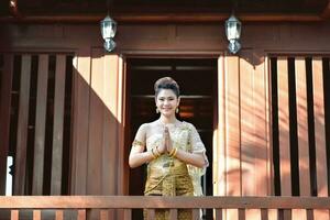 Beautiful Thai girl in Thai traditional costume photo