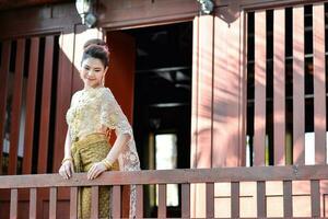 Beautiful Thai girl in Thai traditional costume photo