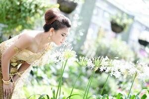 Beautiful Thai girl in Thai traditional costume photo