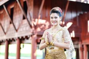 Beautiful Thai girl in Thai traditional costume photo