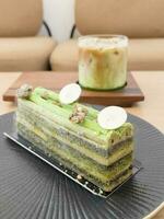 Pistachio opera cake  from homemade bakery photo