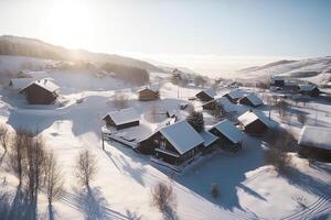 Winter view of the ski resort village, the view from the top. Hotels under the snow. photo