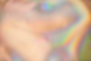 Abstract holographic iridescent foil background photo