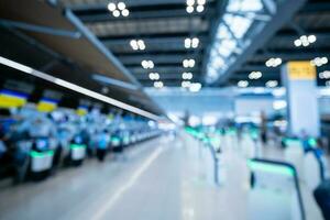 Blurred images of Self-service check-in machine at Check-in counters at Suvarnabhumi International Airport photo