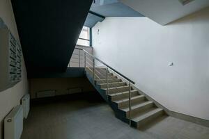 stairs  emergency and evacuation exit stair in up ladder in a new office building. photo