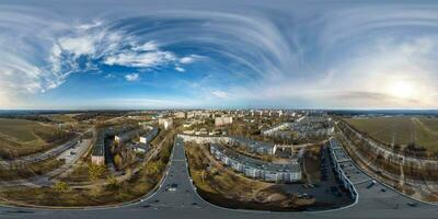 aerial full seamless spherical 360 hdri panorama view above great height over residential area and  high-rise apartment buildings in equirectangular projection. photo