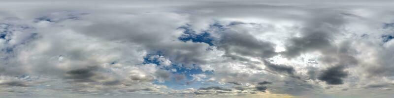 overcast skydome with cumulus clouds as seamless hdri 360 panorama with zenith in spherical equirectangular projection may use for sky replacement in 3d graphics and edit drone shot photo