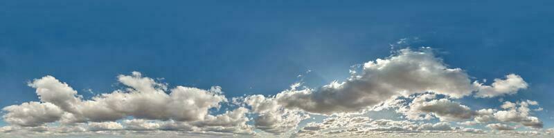 hdri 360 panorama of blue sky with cumulus clouds with zenith in spherical equirectangular projection may use for sky dome replacement in 3d graphics or game development and edit drone shot photo
