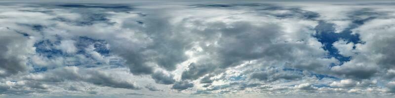 overcast blue sky with cumulus clouds as seamless hdri 360 panorama with zenith in spherical equirectangular projection may use for sky dome replacement in 3d graphics and edit drone shot photo