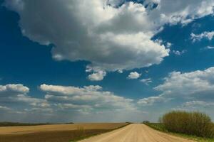 blue sky background with white striped clouds in heaven and infinity may use for sky replacement photo