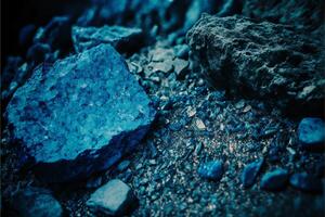 A blue rock is on the ground, surrounded by rocks. Abstract toned rock texture. illustration. photo