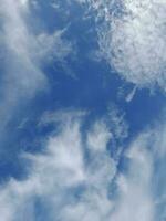 White clouds on the blue sky perfect for the background photo