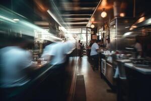 Blurred restaurant background with some people eating and chefs and waiters working. photo