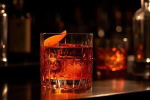 Negroni cocktail with the beautiful reflection of the bar lights on a mirrored surface. photo