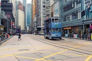 Hong Kong,March 25,2019-Ding ding among the skyscrapers through the streets of Hong Kong during a cloudy day photo