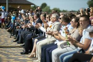 August 29, 2020 Belarus, Gomil. City holiday. Spectators clap their hands. photo