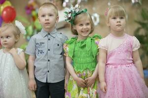 A group of children from kindergarten at the matinee. photo