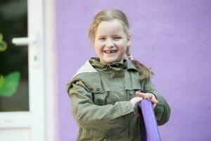 . Cheerful preschool girl. photo